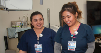 Two nursing students smiling
