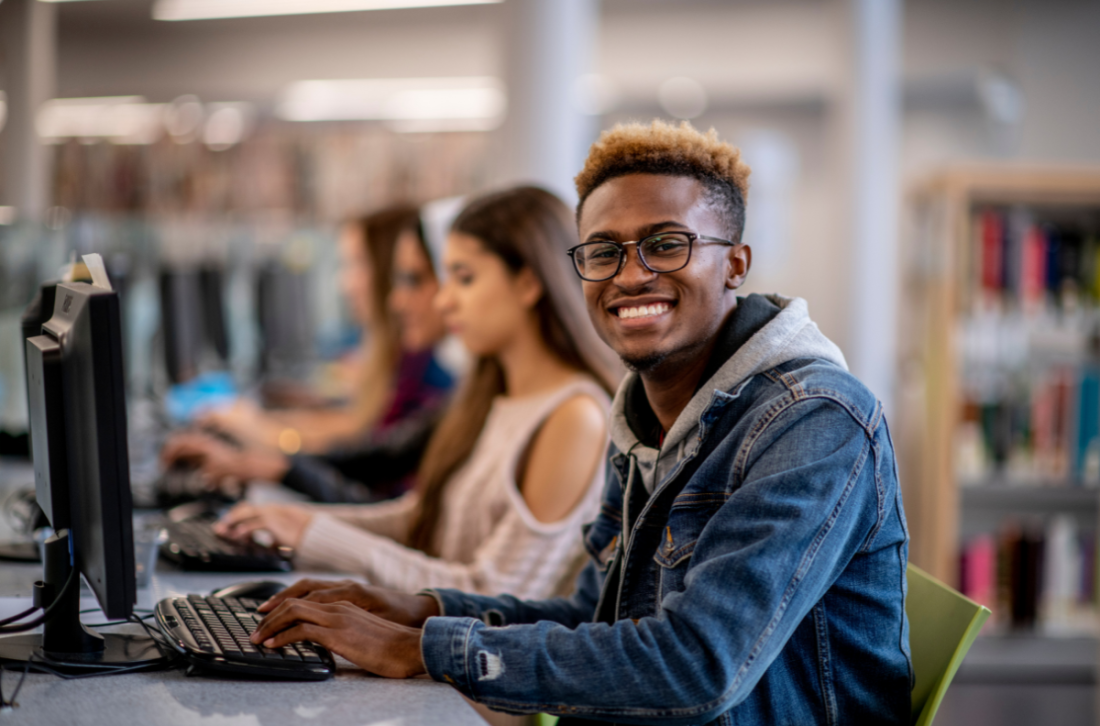 Student using computer at the library