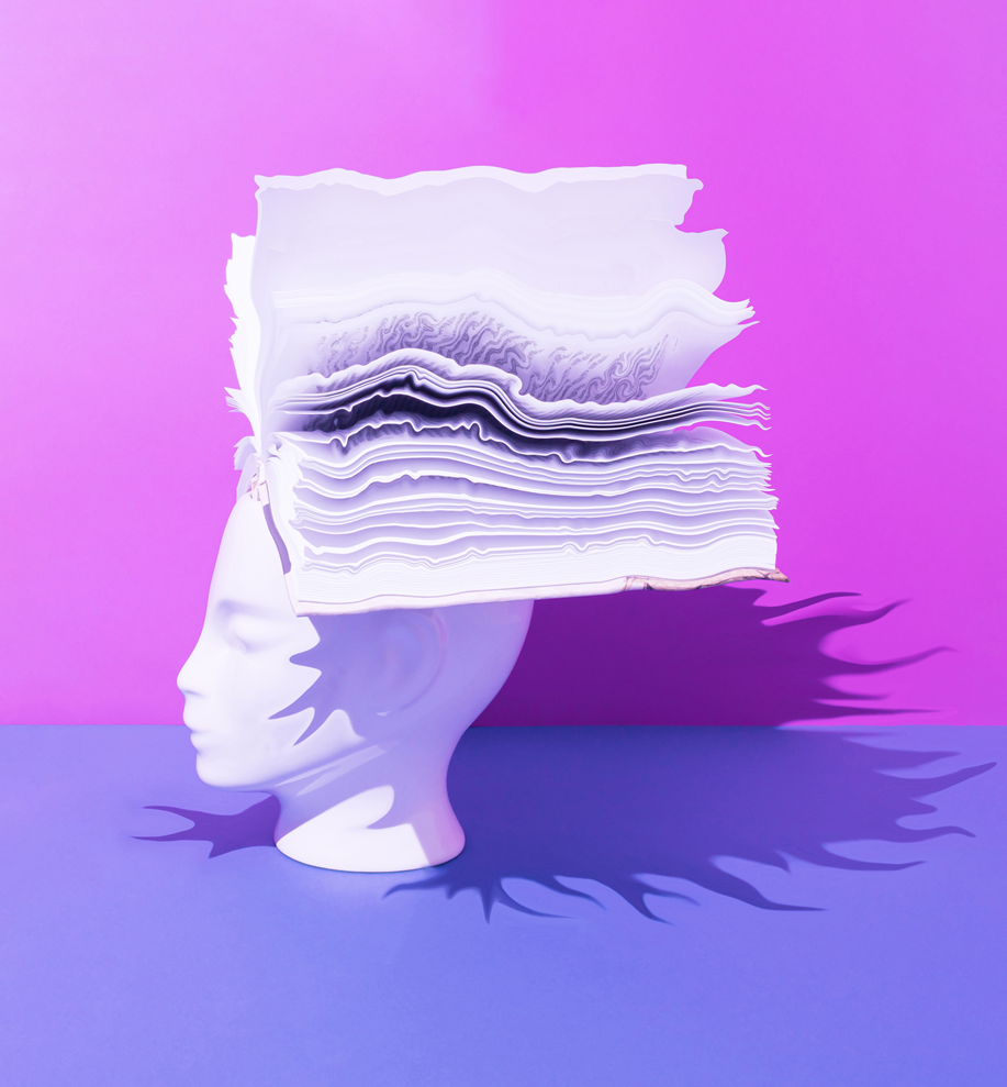 Human head with open book on blue and purple background